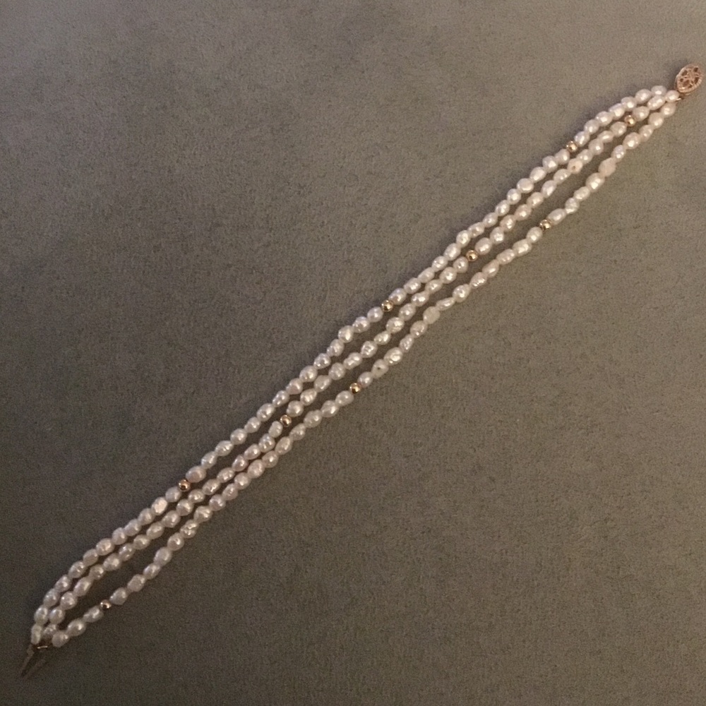 14K 3-strand freshwater pearl bracelet.